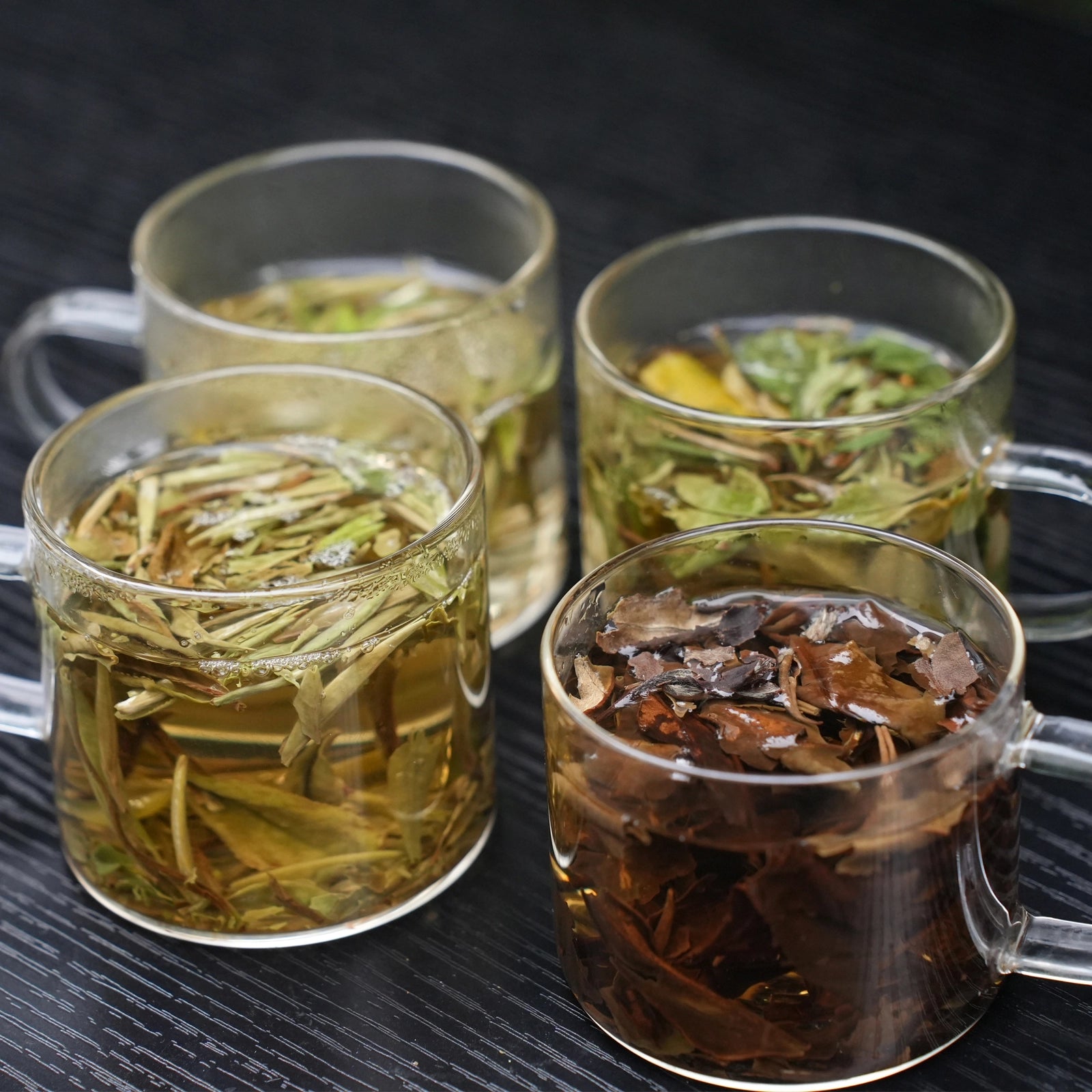 Chinese White Tea Collection Authentic Fuding White Tea with 4 Grades: Includes Silver Needle, White Peony, 2-Year-Old Shou Mei, and 10-Year-Aged Shou Mei.