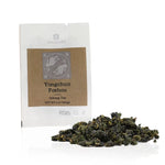 Yongchun Foshou Oolong Tea packaging with tea leaves on a white background